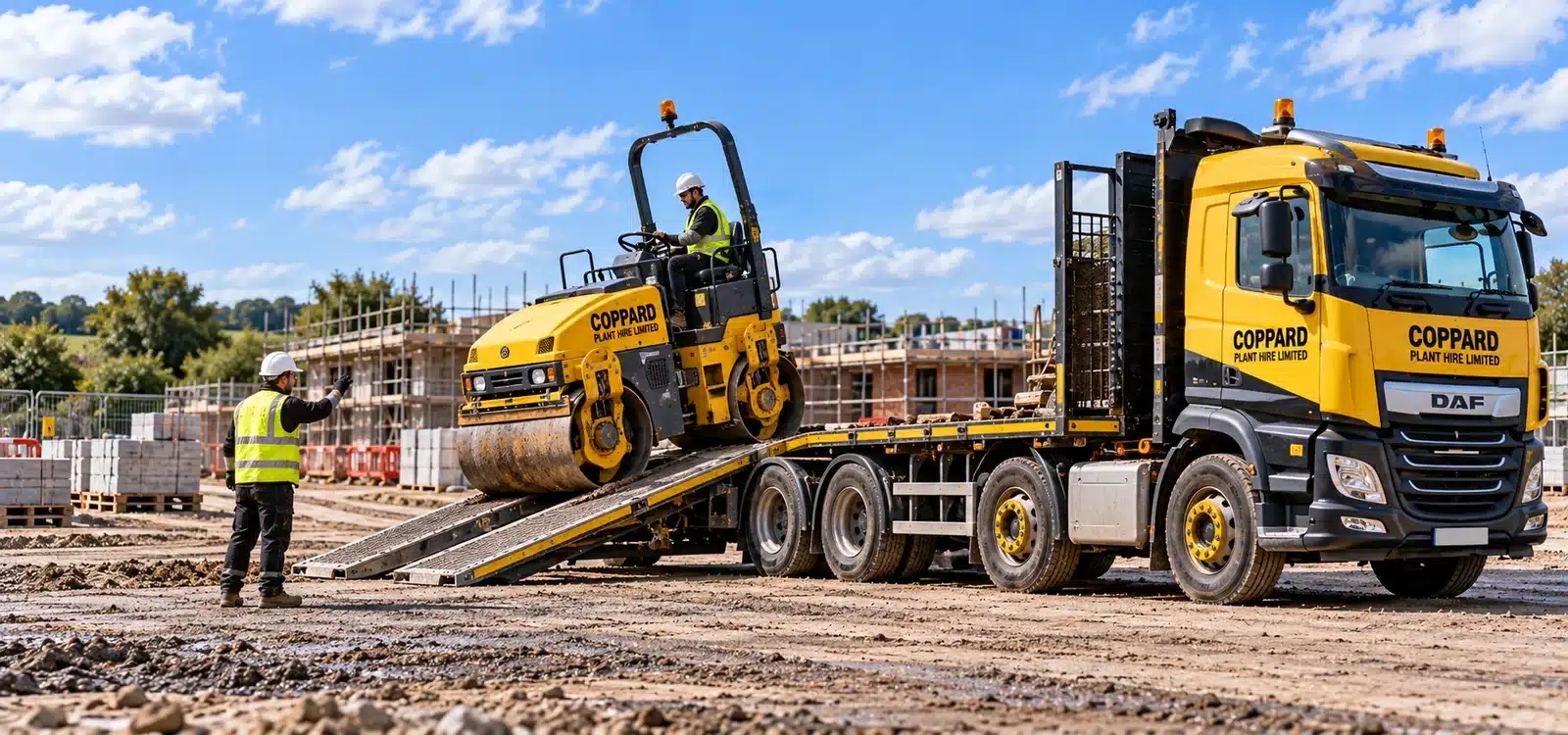 Road roller unloaded from a Coppard delivery lorry