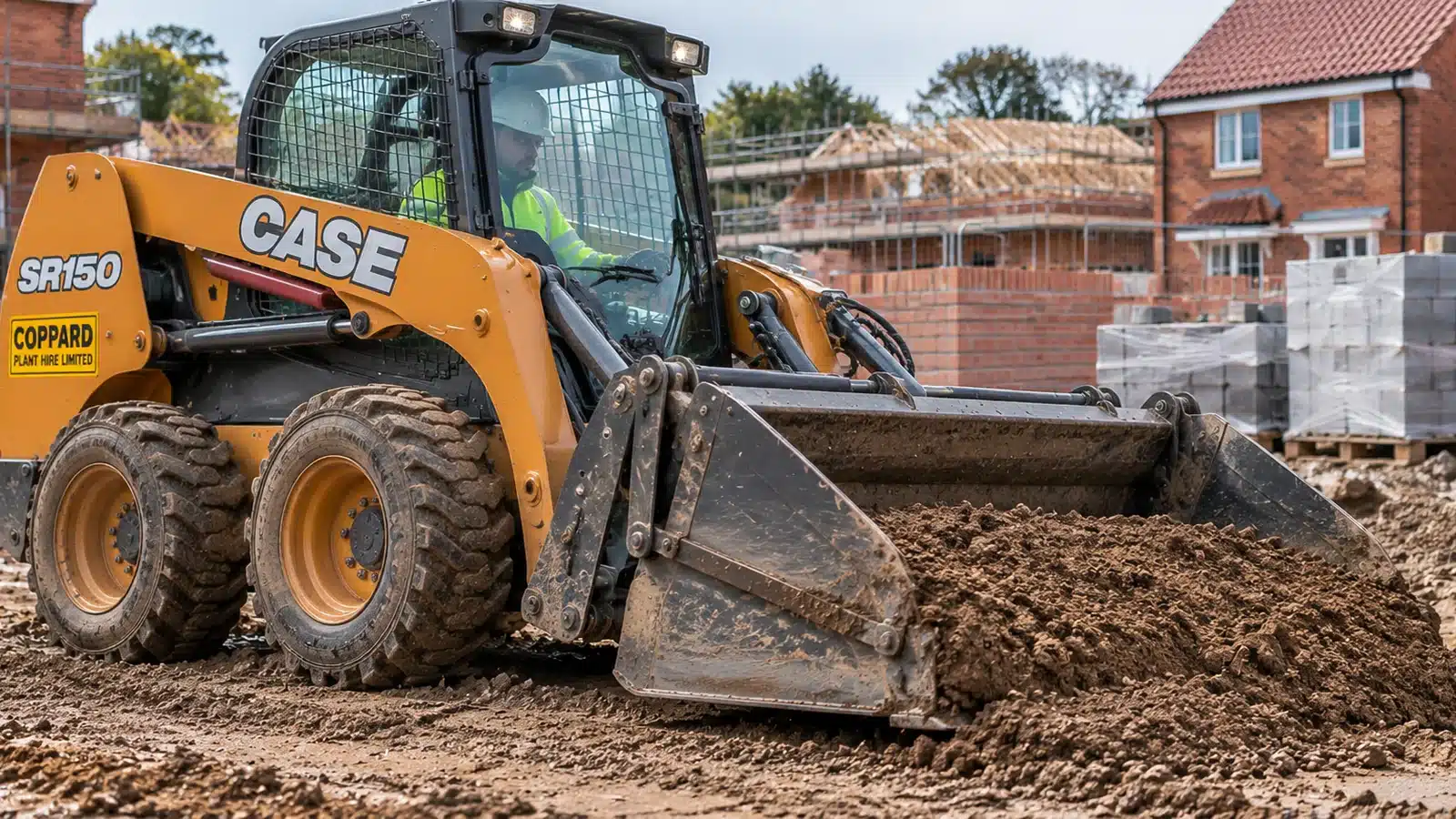 Skidsteer four in one bucket groundworks