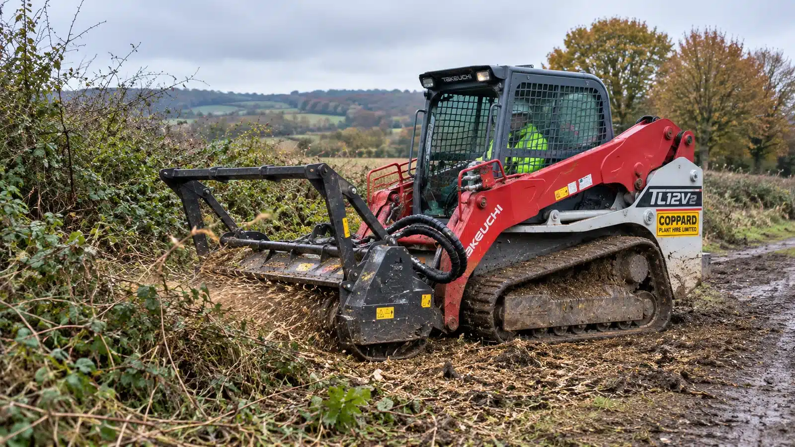 Skidsteer mulching flail hedgerow