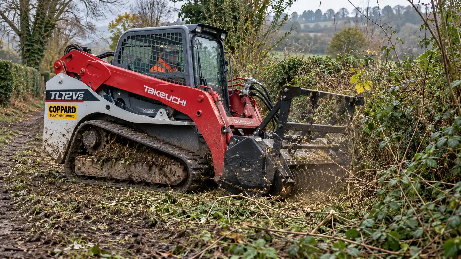 Takeuchi skidsteer mulching flail